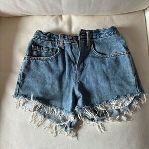 Vintage Levi’s shorts, size 33, fits around size 25. Used, in good condition.